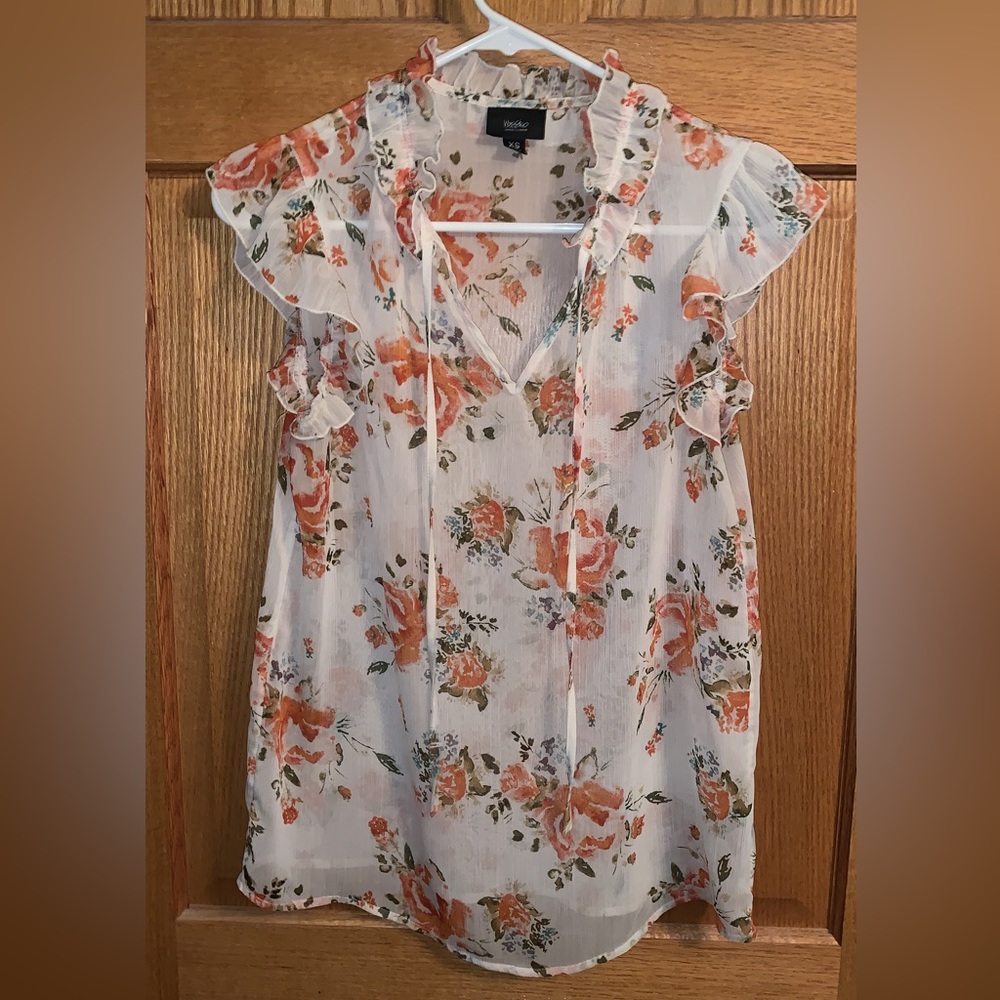 Sleeveless see through blouse